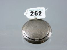 An engine turned silver lidded powder compact with mirror to lid, 0.8 ozs gross, Birmingham 1916