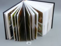 An album containing approximately one hundred and seventy humorous and mixed postcards and