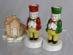 Two Toby Style Spill Vases, depicting figures enjoying a pint, the first green glazed and the