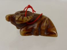 A Chinese Antique Jade Carved figure of a seated buffalo, .