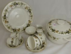 A part Royal Doulton Larchmont dinner service comprising twelve dinner plates, six medium plates,