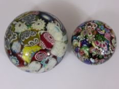 Two French Millefiori Paperweights, the first, a large domed paperweight of colourful intricate