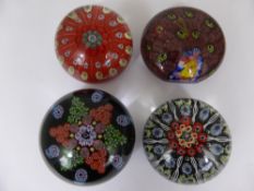 Four Glass Paperweights, including a paperweight in the form of a peacock, a red milliefiori