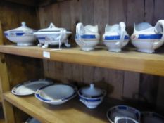 A part Cauldon dinner service comprising eight large dinner plates, twelve smaller dinner plates,