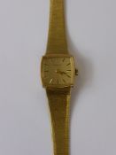 A Lady's 9ct Gold Eterna Wrist Watch, the watch having a 9ct gold bark finished bracelet, approx