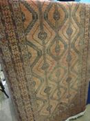 A Vintage Middle Eastern Style  Woollen Rug. The rug having burgundy and black background with