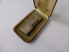 A Vintage Dunhill Lighter, patent no. 726982 in the original box.