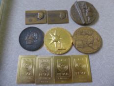 A collection of Finnish sporting medallions including a Volvo 1928 - 1978 50th Year Commemorative
