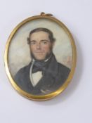 A Portrait Miniature of a Young Gentleman, label to verso reads 