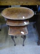 A Nest of Edwardian Mahogany and Walnut tables.
