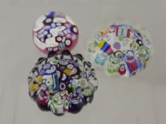 Three John Deacon Millefiori Style Paperweights, colourful canes.