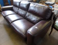 A Contemporary Brown Leather Three Seater Sofa. The sofa measures approx. 250 x 95 x 94 cms.