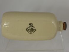 A vintage pottery hot water bottle, Royal Doulton, London, approx. 26 cms. in length excluding the