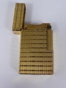 A Vintage Dupont Gold Plated Lighter.