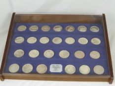 A  collection of 26 Franklin Mint 