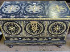 A Middle Eastern Ebony Effect and brass studded chest.