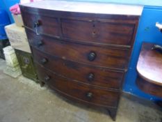 A Victorian Bow Fronted Chest of Drawers on bracket feet with two small drawers and three
