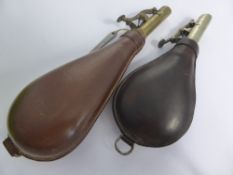 Two Antique Leather Gun Powder Flasks, with stitched leather, the first marked Dixon & Sons and