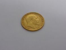 A Solid Gold 1910 Half Sovereign.