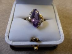 A Lady's 14 ct Gold Amethyst and Diamond Ring, size N, wt 3 gms.
