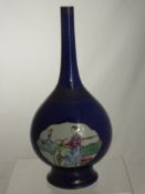 A Chinese Slim Neck Vase, the vase having cobalt blue background with gilt design and two famile