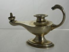 A Silver Asprey Table Cigar Lighter, takes the form of an oil lamp. Birmingham hallmark dd 1926,