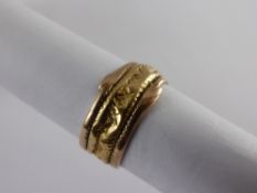 A Georgian High Carat Yellow and Rose Gold Band, inscribed Adm B J Rowley died 7 October 1811 aged