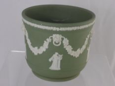 A Mid 20th Century Belleek Bowl with moulded leaf decoration, flared, wavy lip with pink and gilt