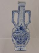Five Pieces of Delft Ware in typical blue and white floral and landscape decoration to include a