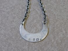 A Solid Silver Antique Wine Label, engraved 