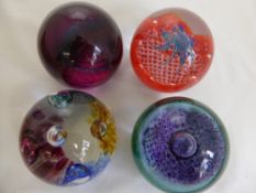 Four Caithness Glass Paper Weights, including 