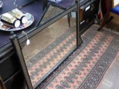 A Victorian Black/Gold Over Mantle Mirror, approx 120 x 80 cms.