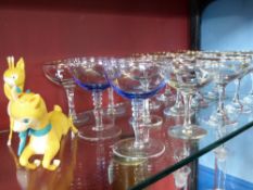 Thirteen Babycham Glasses together with two 