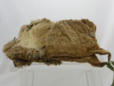 A Seal Skin Eskimo Child's Bonnet together with a pair of Reindeer skin mittens.