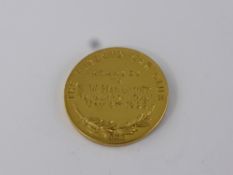 An Art Nouveau 9 ct Gold Presentation Medallion, the medallion reads 