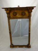 A Gilt Finish Wall Mounted Mirror with Corinthian style columns to either side, lion head decoration