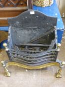 Decorative Cast Iron and Brass Fire Basket, with integrated dogs.