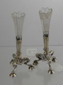 A Pair of Silver Candle Holders, m.m Walker and Hall, Sheffield hallmark, tripod base on hoof