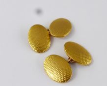A Pair of Gentleman's Cufflink's, 10 k hallmark, mm WJH, the oval cufflink's having a stippled