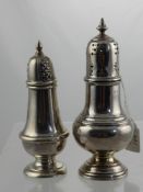 A Silver Sugar Shaker, Birmingham hallmark, mm BH & S, dd 1931 together with a silver pepper