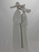 A Lladro Figure of Two Nuns, approx 33 cms high.