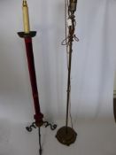 A Wrought Iron Standard Lamp, together with a brass standard lamp, approx 147 x 42 cms and 152 x