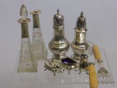 A Silver Cruet Set, Birmingham hallmark, comprising mustard, salt and pepper and a silver sugar