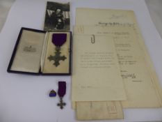 An MBE awarded to Amos Hayes, for services to London Midland and South Railway together with