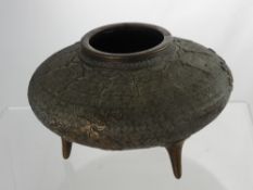 An Antique Chinese Bronze Vase, the shallow urn style vase having woven background with geometric