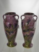 A Pair of Lemon & Crute Torquay Ware Vases, lilac glazing hand painted with birds, approx 30 cms