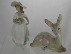 Two Lladro Figures, one depicting a fawn and the other of a girl carrying a basket of flowers. (2)