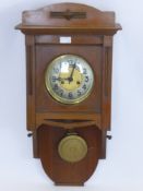 An Oak Cased Mercana Gloria Wall Clock, approx 37 x 76 cms.