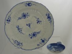 A Circa 1800 Blue and White Worcester Plate, together with a porcelain tea strainer.
