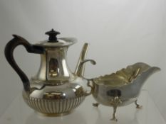 A Victorian Silver Gravy Boat, London hallmark, dated 1892/93, with ribboned edge, mm E & Co Ltd,